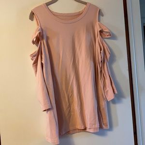 Pink top with sleeve cutouts